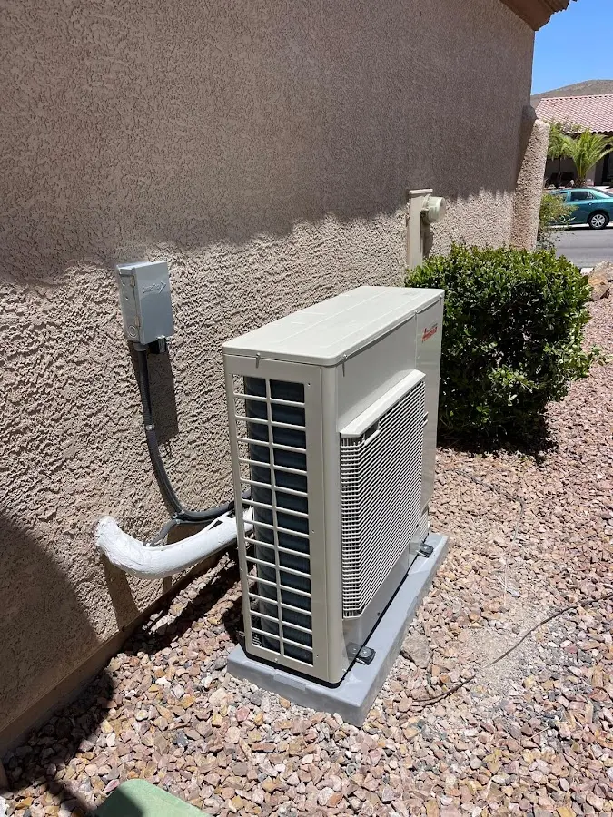 Residential air conditioning condenser unit in Knik-Fairview
